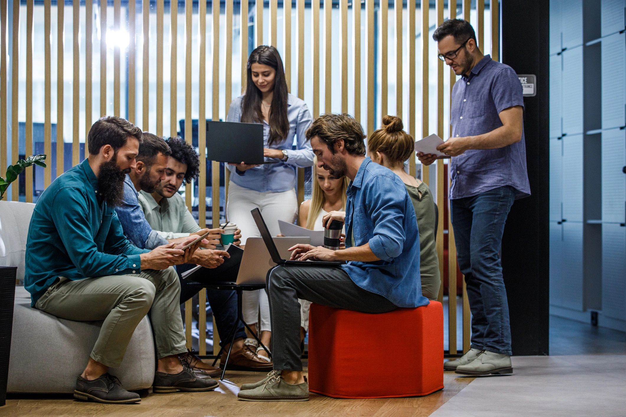 Business team collaborating in an office lounge