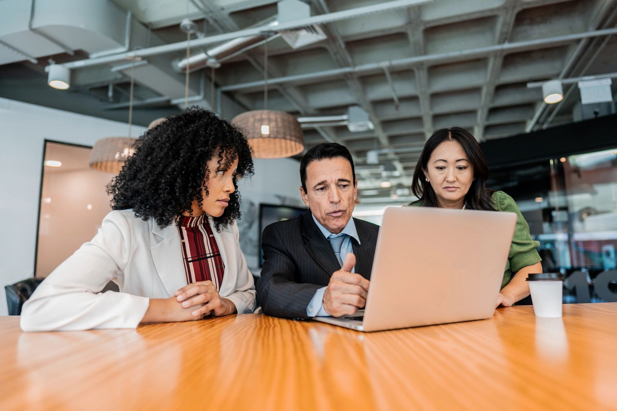 Coworkers meeting together in an office